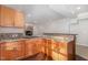 A kitchen with wood cabinets and countertops, providing lots of workspace at 208 W Camden Forest Dr, Cary, NC 27518