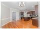 An expansive kitchen featuring modern appliances and opening to a breakfast area, perfect for entertaining at 208 W Camden Forest Dr, Cary, NC 27518