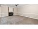 Spacious living room with carpet, fireplace, and recessed lighting at 208 W Camden Forest Dr, Cary, NC 27518
