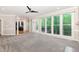 Spacious living room with view to kitchen and outdoor deck at 208 W Camden Forest Dr, Cary, NC 27518