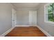 Bedroom with hardwood floors, natural light and a spacious closet at 2108 Laurel Mill Centerville Rd, Louisburg, NC 27549