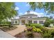 Community clubhouse featuring attractive architecture, manicured landscaping, and a welcoming entrance at 2207 Bankshill Row, Raleigh, NC 27614