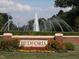 Beautiful community entrance with water fountain and landscaping at 2207 Bankshill Row, Raleigh, NC 27614
