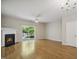 Living room with fireplace, sliding doors, and natural light at 2207 Bankshill Row, Raleigh, NC 27614