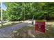 The community offers a scenic walking trail through a lush greenway for residents to enjoy outdoor recreation at 2207 Bankshill Row, Raleigh, NC 27614