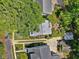 Charming home surrounded by lush greenery, showcasing a well-manicured landscape at 224 E Park Dr, Raleigh, NC 27605