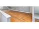 Bonus Room showcasing beautiful hardwood floors, neutral paint, and white trim at 224 E Park Dr, Raleigh, NC 27605