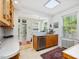 Functional kitchen with tile flooring, stainless steel appliances, and natural light at 224 E Park Dr, Raleigh, NC 27605
