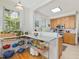 Functional kitchen with breakfast bar, stainless steel appliances, and modern accents at 224 E Park Dr, Raleigh, NC 27605