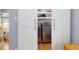 Bright laundry room featuring a barn door closet for washer and dryer at 224 E Park Dr, Raleigh, NC 27605