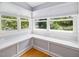 Bright breakfast nook offers natural light and views of the surrounding landscape at 224 E Park Dr, Raleigh, NC 27605
