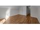 Finished attic with hardwood floors, neutral paint, natural light, and sloped ceilings at 2309 Clerestory Pl, Raleigh, NC 27615