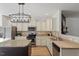Spacious kitchen featuring an island, stainless steel appliances, and granite countertops at 274 Tuscarora Ln, Clayton, NC 27520