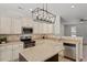 Well-equipped kitchen boasts granite countertops, stainless appliances, and ample cabinet space at 274 Tuscarora Ln, Clayton, NC 27520