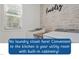 Convenient laundry room with modern machines, built-in cabinetry and natural light at 274 Tuscarora Ln, Clayton, NC 27520