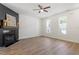 Bright living room with large windows, providing ample natural light and outside views at 274 Tuscarora Ln, Clayton, NC 27520