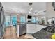 Bright kitchen with granite counters, stainless steel appliances and a view to the backyard at 312 Grassy Point Rd, Apex, NC 27502
