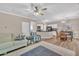 Open concept living area with access to the kitchen, dining area, backyard, and front entryway at 312 Grassy Point Rd, Apex, NC 27502