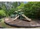 Enjoy the community playground with modern slides, climbing structures, and a safe, fenced play area at 312 Grassy Point Rd, Apex, NC 27502