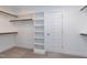 Functional walk-in closet with ample shelving and rod space for organization at 3627 River Watch Ln, Franklinton, NC 27525