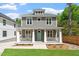 Charming two-story home with a welcoming front porch and professionally landscaped yard at 3932 Old Chapel Hill Rd, Durham, NC 27707