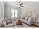 Inviting living room with natural light, comfortable seating, and stylish decor at 3932 Old Chapel Hill Rd, Durham, NC 27707