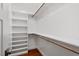 Clean walk-in closet with built-in shelves and plenty of storage space at 3932 Old Chapel Hill Rd, Durham, NC 27707