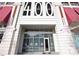 Stylish building entrance with glass doors and modern architectural details offering a welcoming entryway at 400 W North St # 814, Raleigh, NC 27603