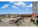 Inviting outdoor terrace with comfortable seating, grill, and panoramic views, perfect for relaxing and entertaining at 400 W North St # 814, Raleigh, NC 27603