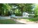 A charming house with a shed, and a white picket fence at 409 Green St, Sanford, NC 27330