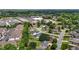 Aerial view of a neighborhood with well-maintained homes and lush greenery at 411 Westhampton Dr, Burlington, NC 27215