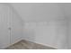 This walk-in closet has built-in wire shelving, providing ample storage and organizational space with neutral carpet at 411 Westhampton Dr, Burlington, NC 27215