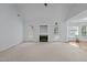 Spacious living room with fireplace, vaulted ceilings and hardwood floors at 411 Westhampton Dr, Burlington, NC 27215