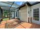 Bright sunroom with glass ceiling, tile floor, rug, and sink with convenient access to the outdoors at 411 Westhampton Dr, Burlington, NC 27215