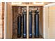 A water filtration system that includes three large black filter tanks, digital meters, and wooden casing for seamless integration at 4418 Carpenter Pond Rd, Durham, NC 27703