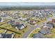 Real estate showcasing a well-planned community with manicured lawns and varied home styles at 47 Scarlet Bell Dr, Youngsville, NC 27596
