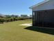 Exterior of the property featuring a patio area and a screened-in porch at 47 Scarlet Bell Dr, Youngsville, NC 27596