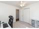 Bright bedroom with a ceiling fan, closet, and neutral carpeting at 4908 Birkenhead Ct, Apex, NC 27539