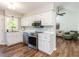 The kitchen features stainless steel appliances and white cabinets at 4908 Birkenhead Ct, Apex, NC 27539