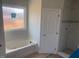 Bright bathroom featuring a large window and a white bathtub, ready for finishing touches at 499 Mulberry Rd, Spring Hope, NC 27882
