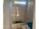 Clean bathroom featuring a shower over tub and a toilet with white fixtures at 499 Mulberry Rd, Spring Hope, NC 27882