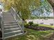 Beautiful home with private dock access from the backyard, complemented by a lush lawn and vibrant garden at 5 Bobby Parker Pl, Durham, NC 27703