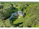 Stunning aerial view of a beautiful home nestled among lush green trees and a well-manicured lawn at 503 Belmont Cir, Wake Forest, NC 27587