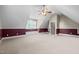 Bright and spacious bonus room with neutral carpet, perfect for recreation or relaxation at 503 Belmont Cir, Wake Forest, NC 27587