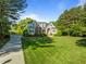 Beautiful home showcasing a well-manicured lawn, complemented by a brick and siding exterior at 503 Belmont Cir, Wake Forest, NC 27587