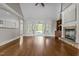 Spacious living area with hardwood floors, and French doors leading to an outdoor space at 503 Belmont Cir, Wake Forest, NC 27587