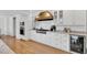 Gourmet kitchen with granite countertops, stainless steel appliances, and custom cabinetry, perfect for cooking and entertaining at 506 S King Ave, Dunn, NC 28334