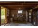 Unfinished basement area with exposed brick and a small window at 508 E Trinity Ave, Durham, NC 27701