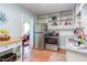 Kitchen area featuring a stainless steel refrigerator and wood flooring at 508 E Trinity Ave, Durham, NC 27701