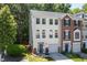The well-kept two-story home has a front entry garage and is surrounded by greenery at 5420 Vista View Ct, Raleigh, NC 27612